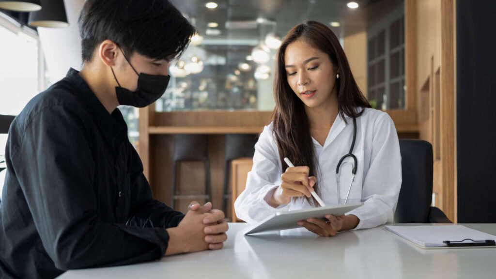 【公式】イタリア医学部出願サポート<無制限プラン> 2 young man patient having consultation with doctor 2024 12 04 10 13 06 utc edited