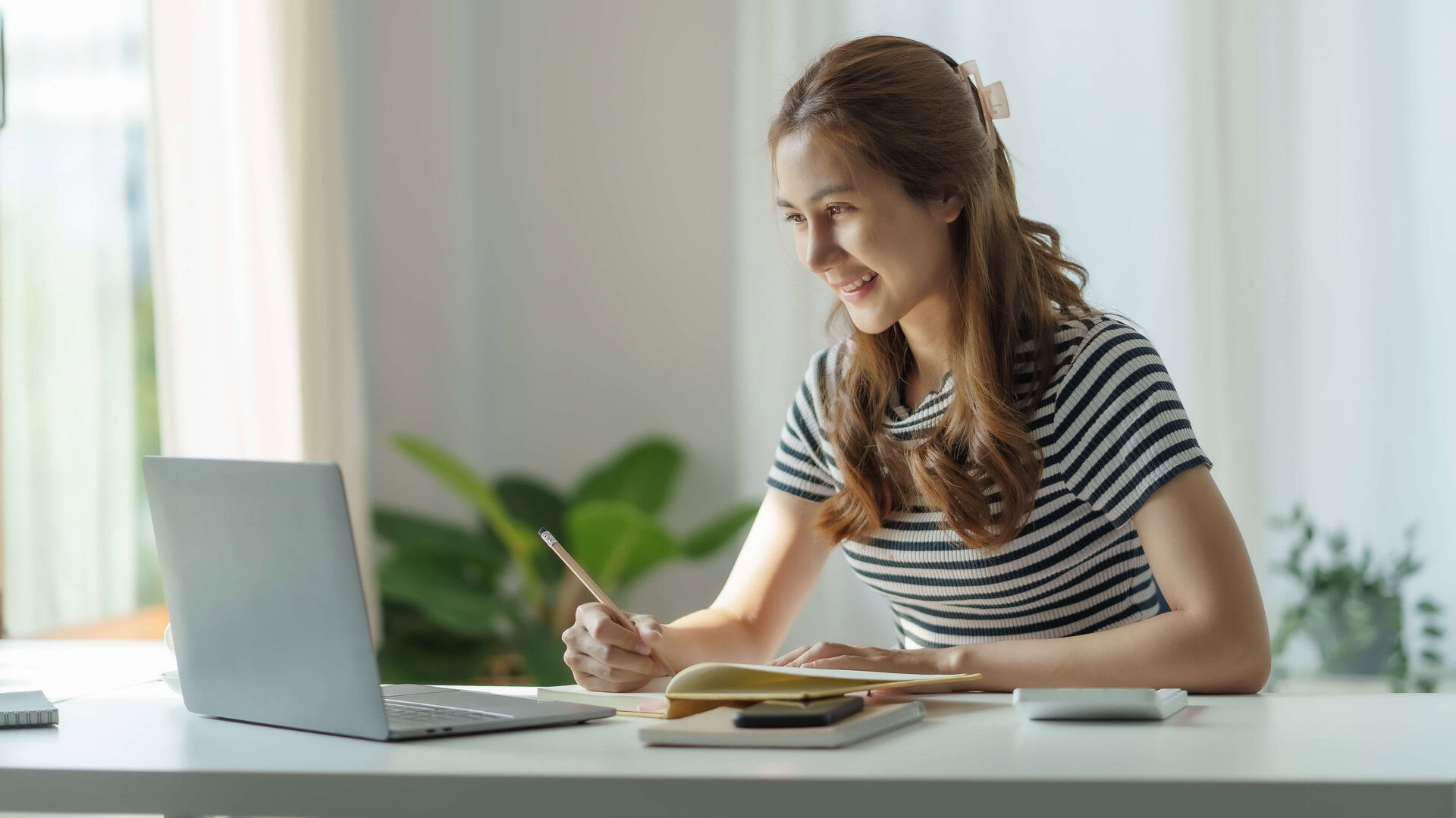 asian female student studying online on laptop 2025 03 08 15 40 29 utc edited