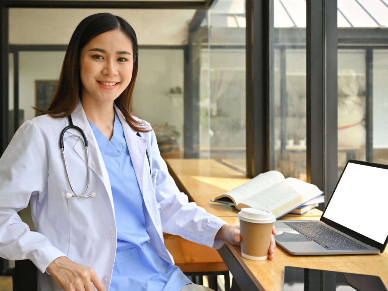 confident asian female doctor in white coat and st 2024 11 29 23 12 01 utc 1920x1080 1 edited