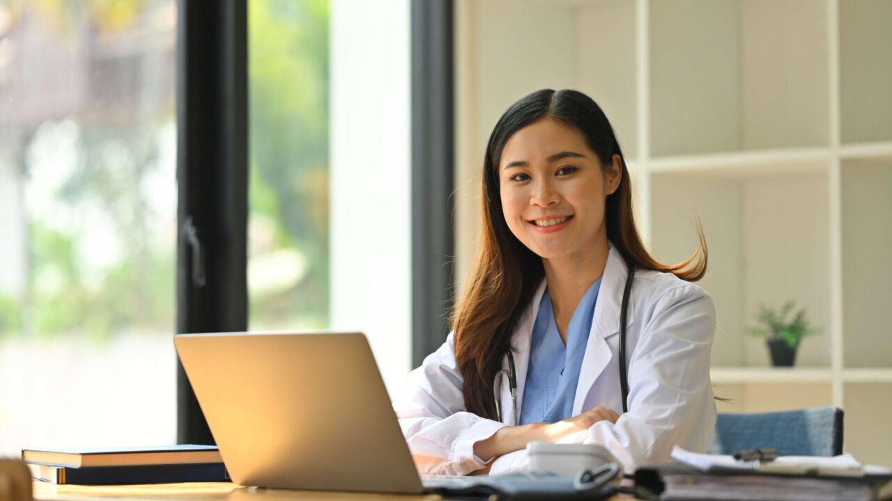confident asian female doctor in white coat and st 2024 12 04 15 40 33 utc 1920x1080 1